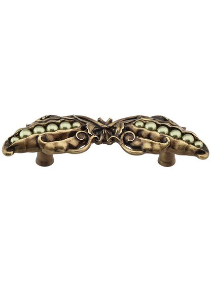 Pearly Peapod Drawer Pull in Antique Brass.